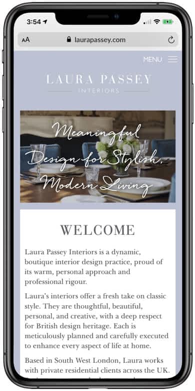 A mobile phone with Laura Passey Website on the screen.